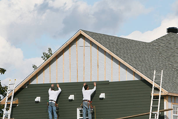 Professional Emergency Siding Repair technician working in Armbrust, PA